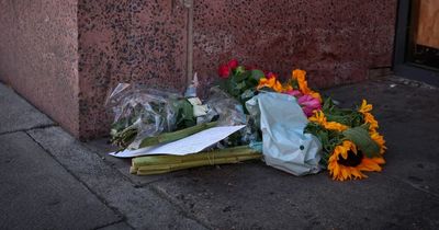 Floral tributes left after man's death outside Nottingham apartment block