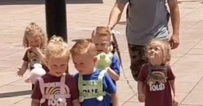 Dad of quintuplets, 5, divides opinion after taking kids out on a leash 'like dogs'