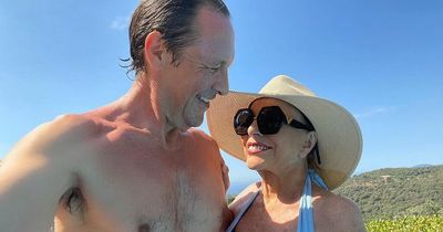 Joan Collins, 89, wows fans in blue bikini as she soaks up sun with toyboy husband, 56