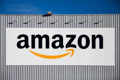 Amazon workers walk out of major warehouse in pay and conditions dispute