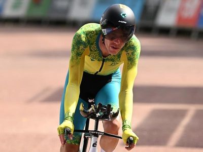 Dennis wins in drama-filled time trial