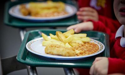Children who get free school meals in England earn less as adults, study finds