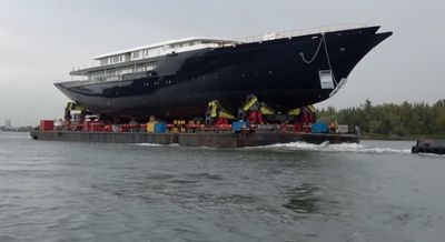 Jeff Bezos’s $500m yacht stealthily towed out of Dutch shipyard after bridge dismantling controversy