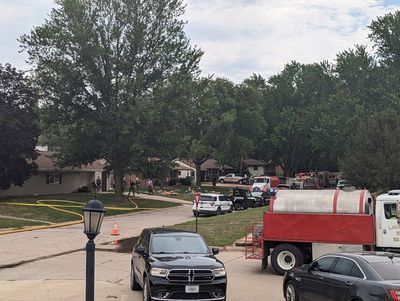 Patrol: 4 found dead in 2 burning homes in Nebraska city