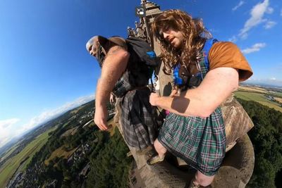 'Freedom!': Braveheart impersonators base jump off the Wallace Monument