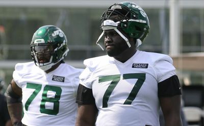 Mekhi Becton sports knee brace at Jets training camp