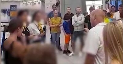 Angry Ryanair passengers confront staff after being stranded in Spain