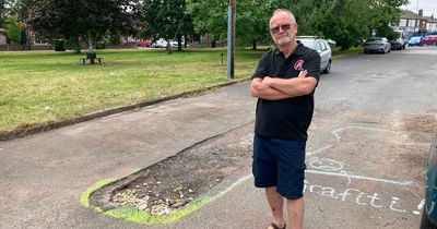 Man at war with neighbours as he builds 'blockade' to stop parents on school run