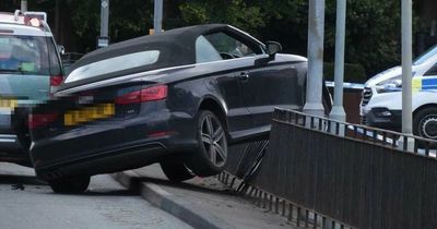 Car 'ploughs into pedestrian barrier' in Edinburgh as man arrested