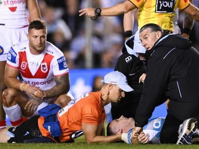 Shark Tracey leaves NRL game in stretcher