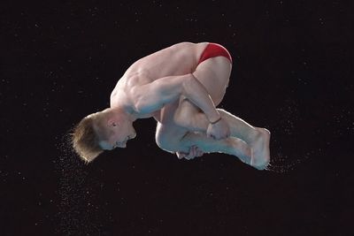 Jack Laugher bounces back from nightmare opener to complete all-English podium