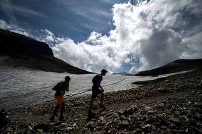 Runners take on Swiss glacier race despite melt