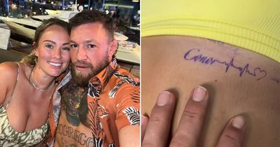 UFC star Conor McGregor shows off fiancee's new tattoo in suggestive video