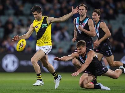 Into top eight, Richmond keeping lid on
