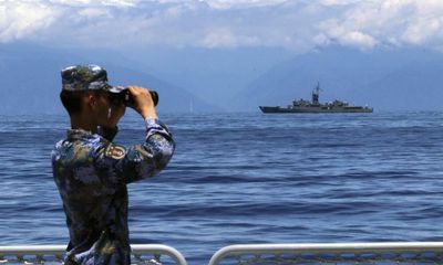 Taiwan says China used 66 planes and 14 warships in Sunday’s drills – as it happened