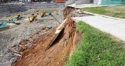 Heavy rain suspected trigger for construction wall failure in Phillip