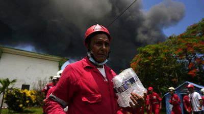 Cuba asks for international help as deadly oil depot fire rages
