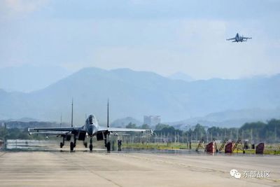 China to conduct 'regular' military drills east of Taiwan Strait median line - state media
