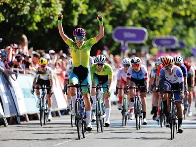 Baker wins third Games gold in road race