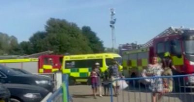 Crying woman seen shouting for girl, 11, found dead at water park birthday party