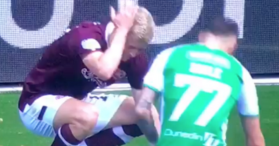 Hearts player showered with chips as fans hurl objects during Edinburgh derby