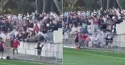 Rugby fans fall head first into concrete as stand collapses in terrifying moment