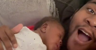 Dad overjoyed after his tiny newborn baby pushes herself up and kisses him back