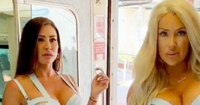 Playboy models board train in nothing but lingerie after 'hard day at work'