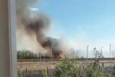 Around 30 homes saved as firefighters take on Feltham inferno sweeping across grassland