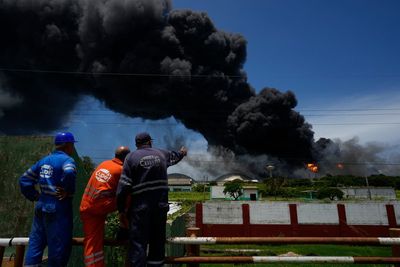 One dead, 122 injured in massive fire at Cuban oil facility after lightning strike