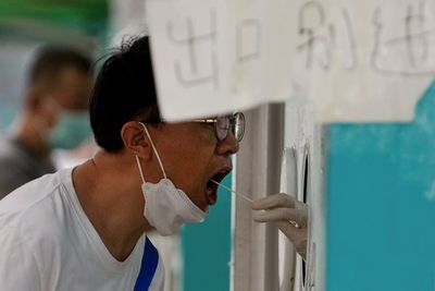 COVID cases rise in China's Hainan, tourists stranded