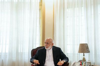 Hamid Karzai stays on in Afghanistan — hoping for the best, but unable to leave