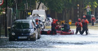 London floods: Mayhem as road turns into river with street completely submerged