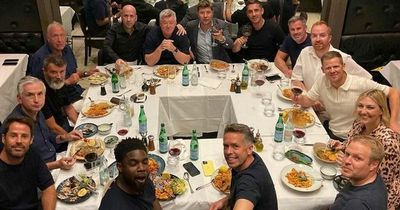 Roy Keane refuses to smile as Sky Sports team pose for photo during meal