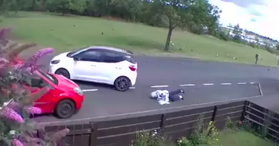 Sickening footage shows terrified Scots pensioner screaming as bag thief drags her along road with car