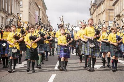 More than 150 pipers march through Glasgow playing Scotland the Brave