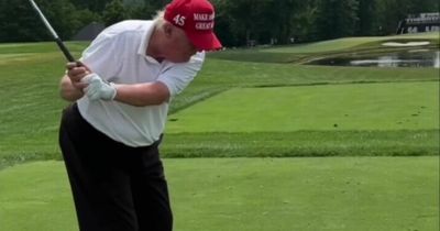 Donald Trump heckled at his own golf club as he sends howler of a shot into the water