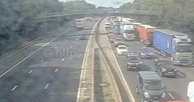 Hour delays on M6 and lanes closed as two vans and car crash