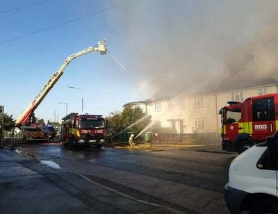 Large blaze threatens four terraced homes in Crayford