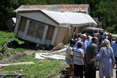 Biden tries to heal Kentucky flood victims -- and country