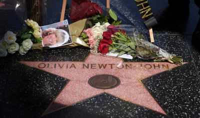 In Australia, tributes pour out for pop star Newton-John