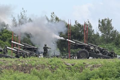 Taiwan holds live-fire drills as China extends war games