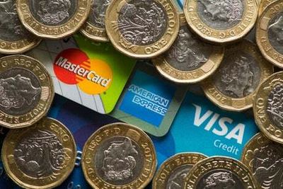 More pain for consumers as credit card interest rates hit 24-year high