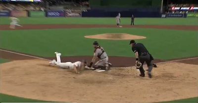 Padres fans were so mad at an overturned call on a run scored, they threw stuff on the field