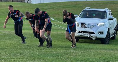 Former Royal Marine completes marathon while pulling pick-up truck in extreme challenge in Tynemouth