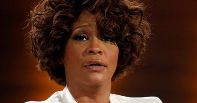 Whitney Houston spent tragic final moments 'feasting on food and singing to herself'