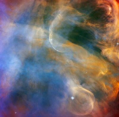 Look! Hubble snaps a dazzling image of the Orion Nebula's surreal rainbow clouds