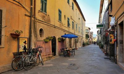 ‘A disturbing wave’: midges threaten tourist trade in Italian town