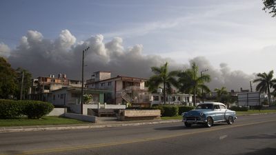 A raging fire at a Cuban oil facility worsens the island's energy crisis