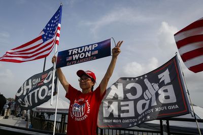 Backers turn up at Mar-a-Lago to show support for Donald Trump after FBI raid